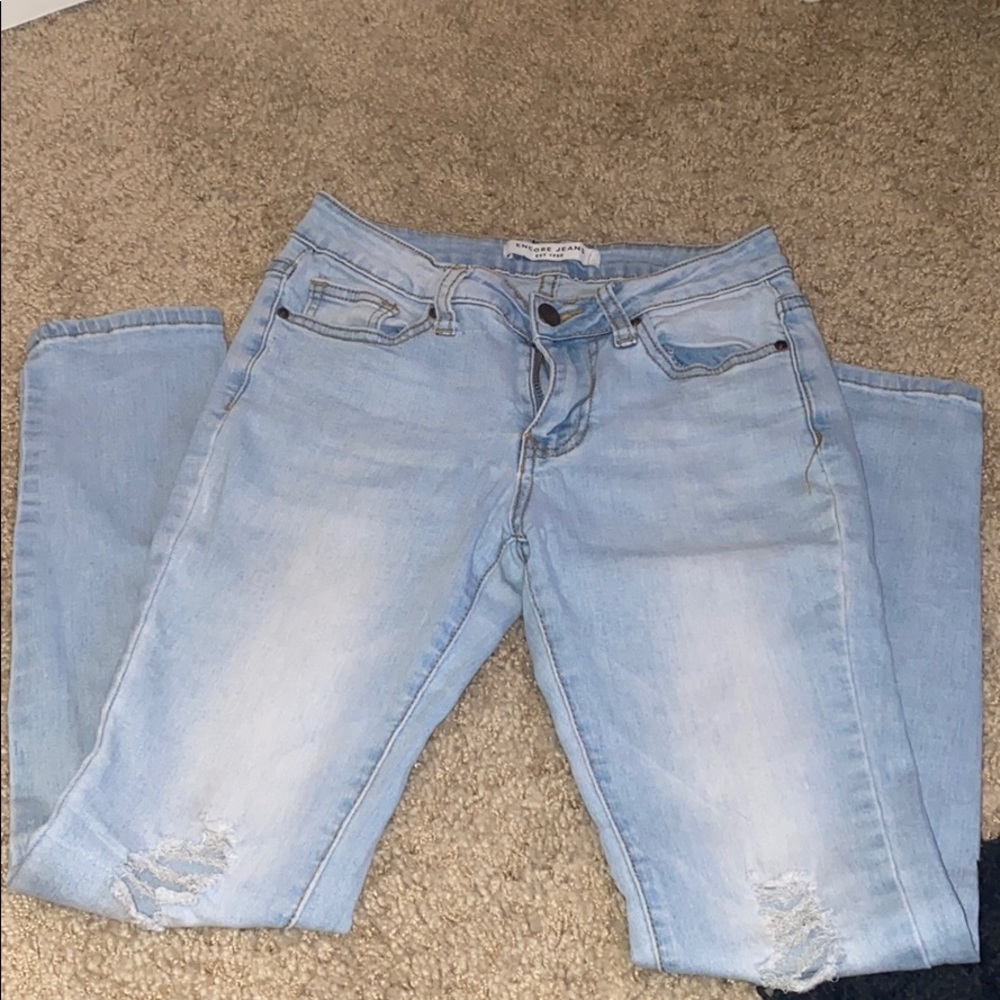 Blue jeans whit small holes